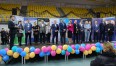Na zdjęciu znajdują się przedstawiciele ważnych firm i instytucji w Koszalinie, którzy stoją na scenie.