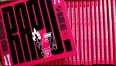 Grafika przedstawia okładkę płyty CD w kolorze czerwonym z napisem "Z archiwum koszalińskiego rapu/wolumin drugi"