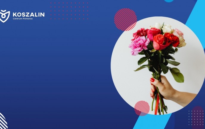 ręka trzymająca bukiet z kwiatami